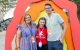 St. Jude Dream Chicago attendees stand in front of a rainbow sculpture. 