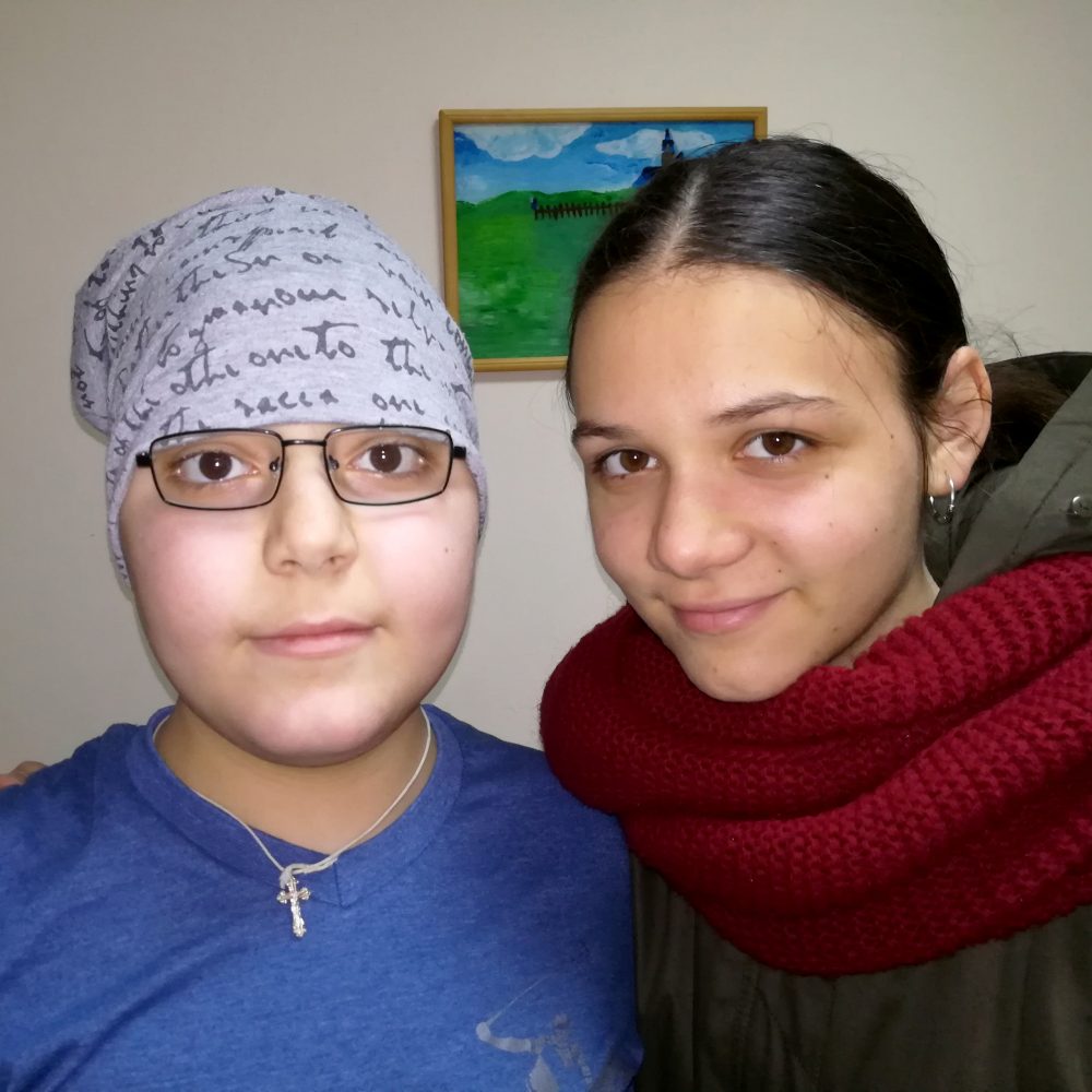 Gheorghe and his sister, Ana, at her birthday in the midst of final stage of treatment.