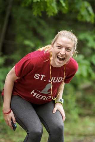 Sarah Emerson, fundraiser for St. Jude, smiles and cheers