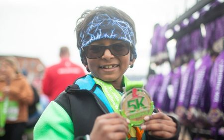 Inspiring Determination: St. Jude patient finishes his first 5K to raise money for research hospital.