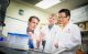 Michael Dyer, Dan Hiler, and Xiang Chen collaborating in the lab