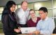 Co-senior authors Jinghui Zhang, Ph.D., and Leslie Robison, Ph.D., discuss results with co-first authors Carmen Wilson, Ph.D., and Zhaoming Wang, Ph.D.