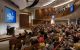 Dr. James Downing talks to an auditorium full of employees as part of the Blueprint Series