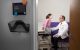 Principal investigator Thomas Merchant, D.O. Ph.D., consults with an ependymoma patient at St. Jude.