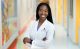 Ester Obeng, MD, PhD, in hallway at St. Jude