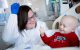 Sara Martin celebrates with patient Carson Corrigan