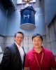 Charalampos “Babis” Kalodimos, Ph.D, and Youlin Xia stand in front of the new Nuclear Magnetic Resonance Spectrometer being installed at St. Jude.