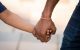 Holding hands.
