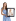 St. Jude patient Emma poses for a studio portrait, holding a framed photo taken while she was in treatment at St. Jude.