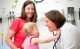 Sara M. Federico, MD, with a St. Jude patient
