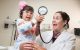 Rachel Brennan, MD, with a St. Jude patient