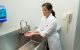 Woman washing her hands