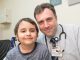 Dr. Wassim Chemaitilly with patient Kye
