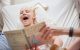 Patient Lilly laughing, reading a book