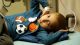 St. Jude patient Luis on a hospital bed