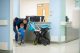 Patient Miguel walks with his mom