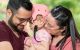 Janelle, paciente de St. Jude abrazada por sus padres