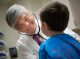 St. Jude patient Warner with doctor