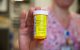 Pill bottle with warning
