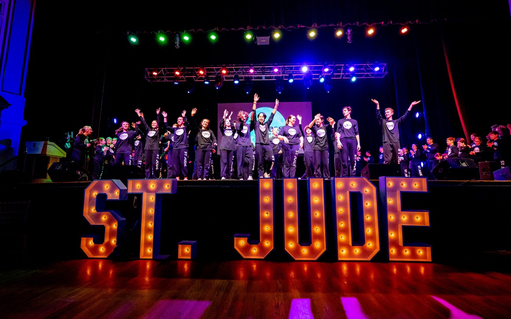 Dancers onstage at the family-friendly St. Jude Fitness for a Cure charity event.