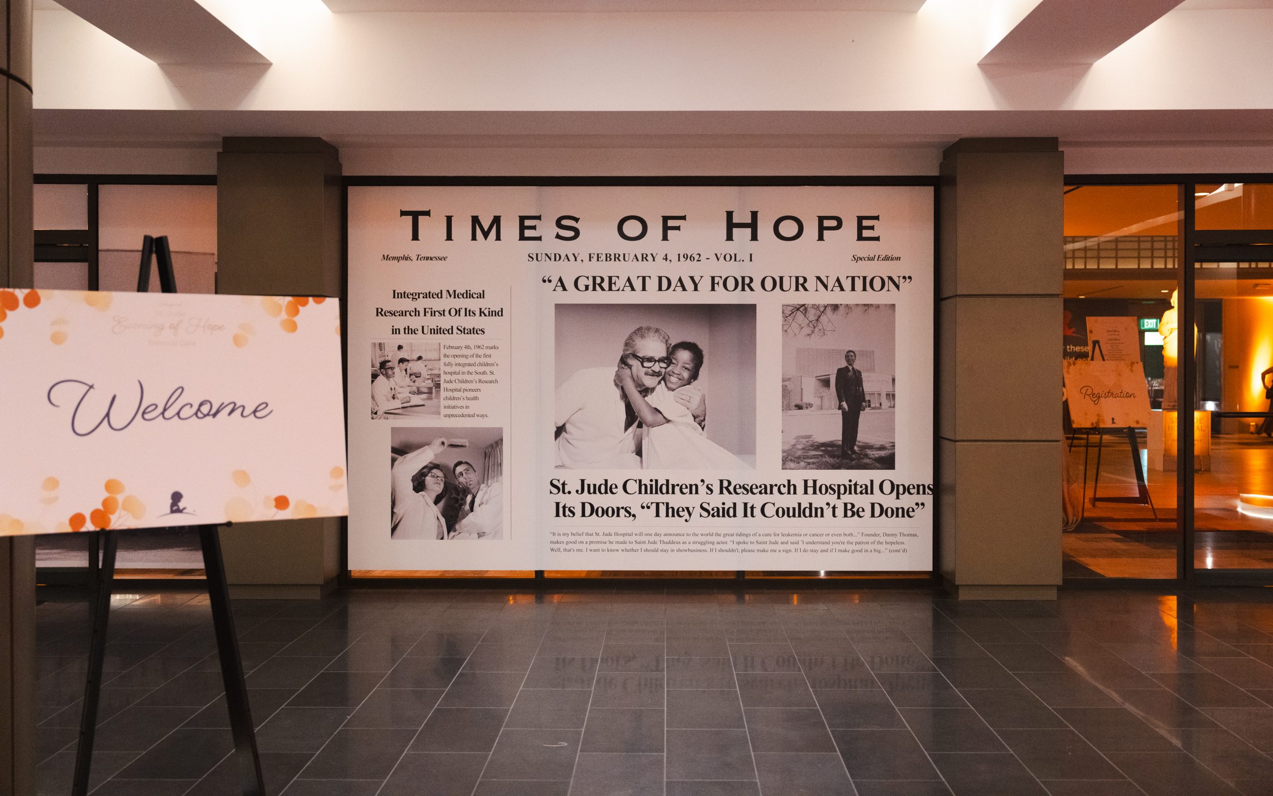 The entrance to St. Jude Evening of Hope Los Angeles, featuring a welcome sign and wall decor that reads "Times of Hope."