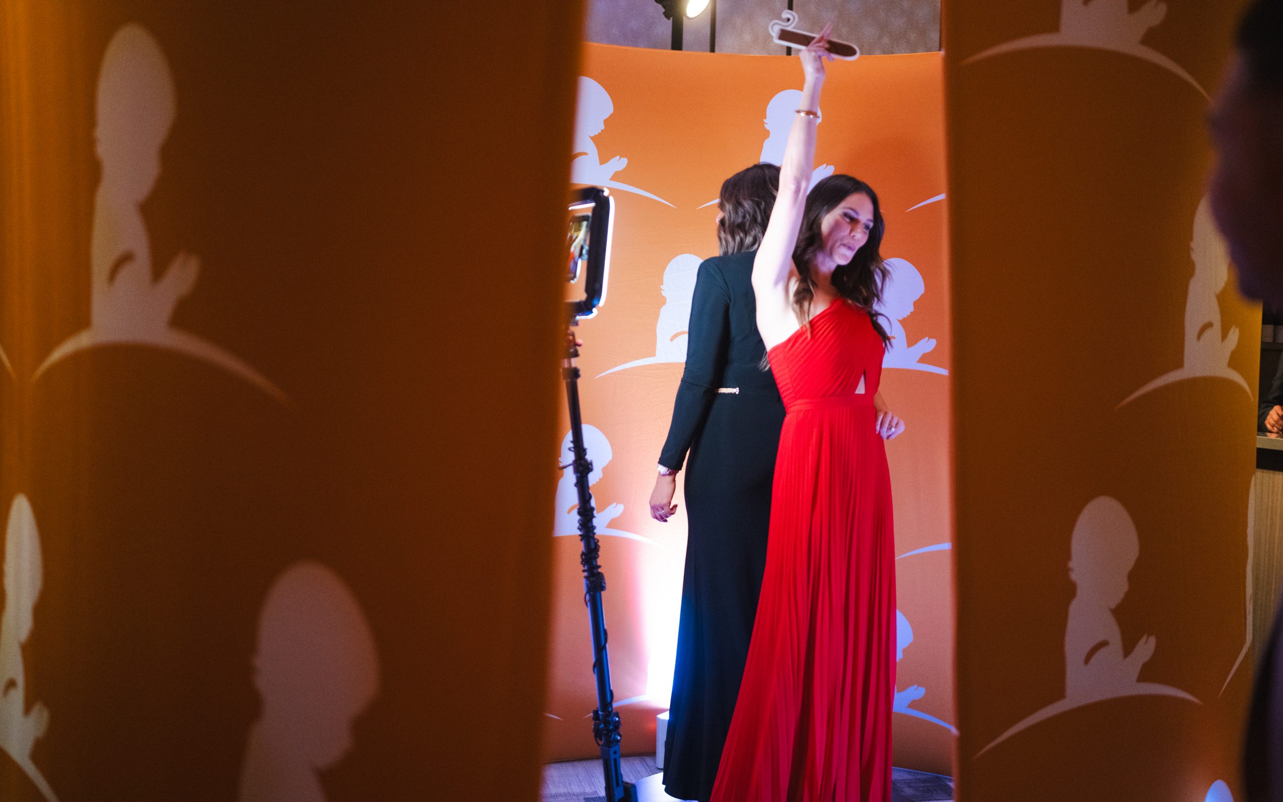 St. Jude Evening of Hope Los Angeles attendees pose in a photo booth. 