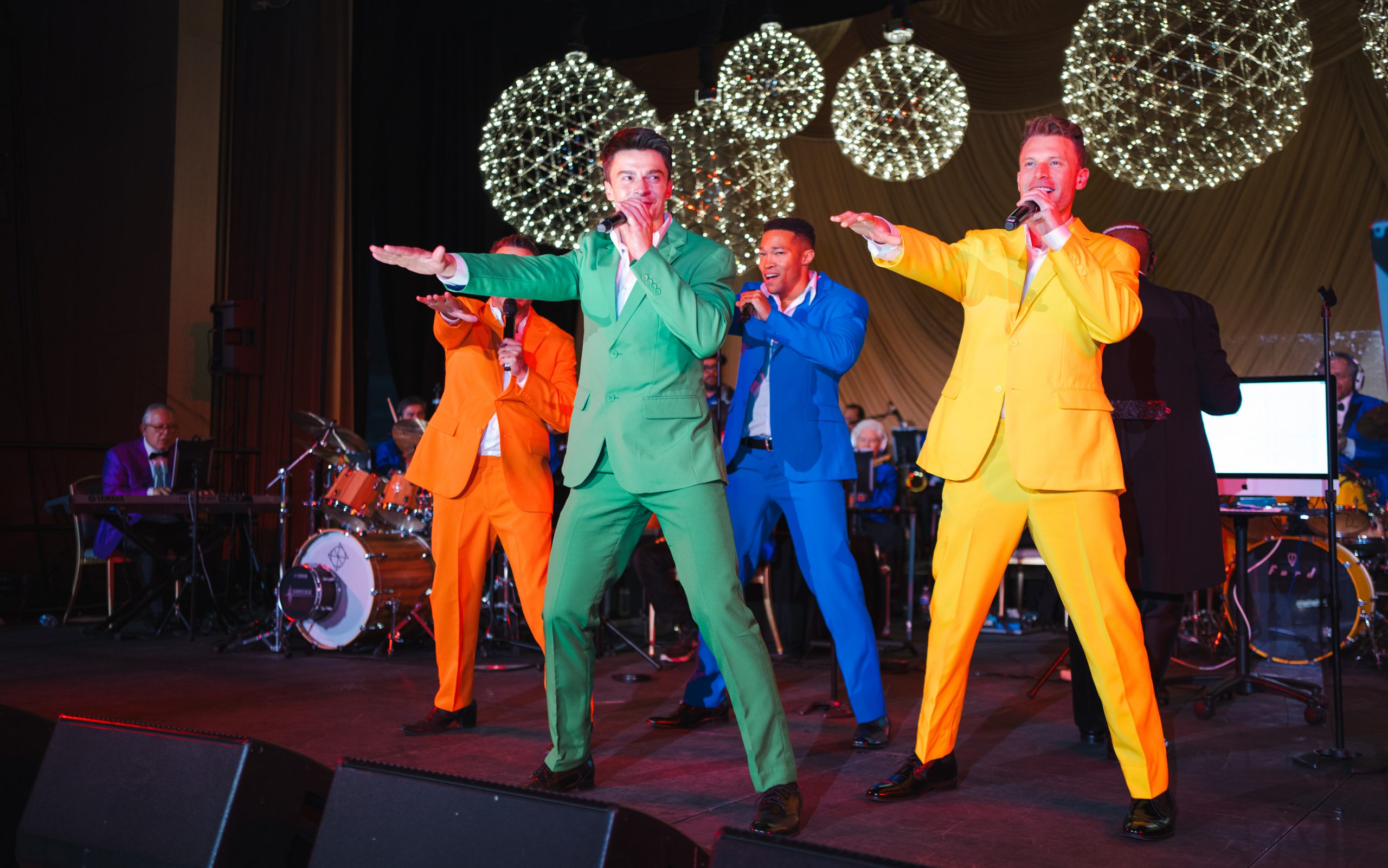 Performers dance on stage at Evening of Hope Los Angeles. 