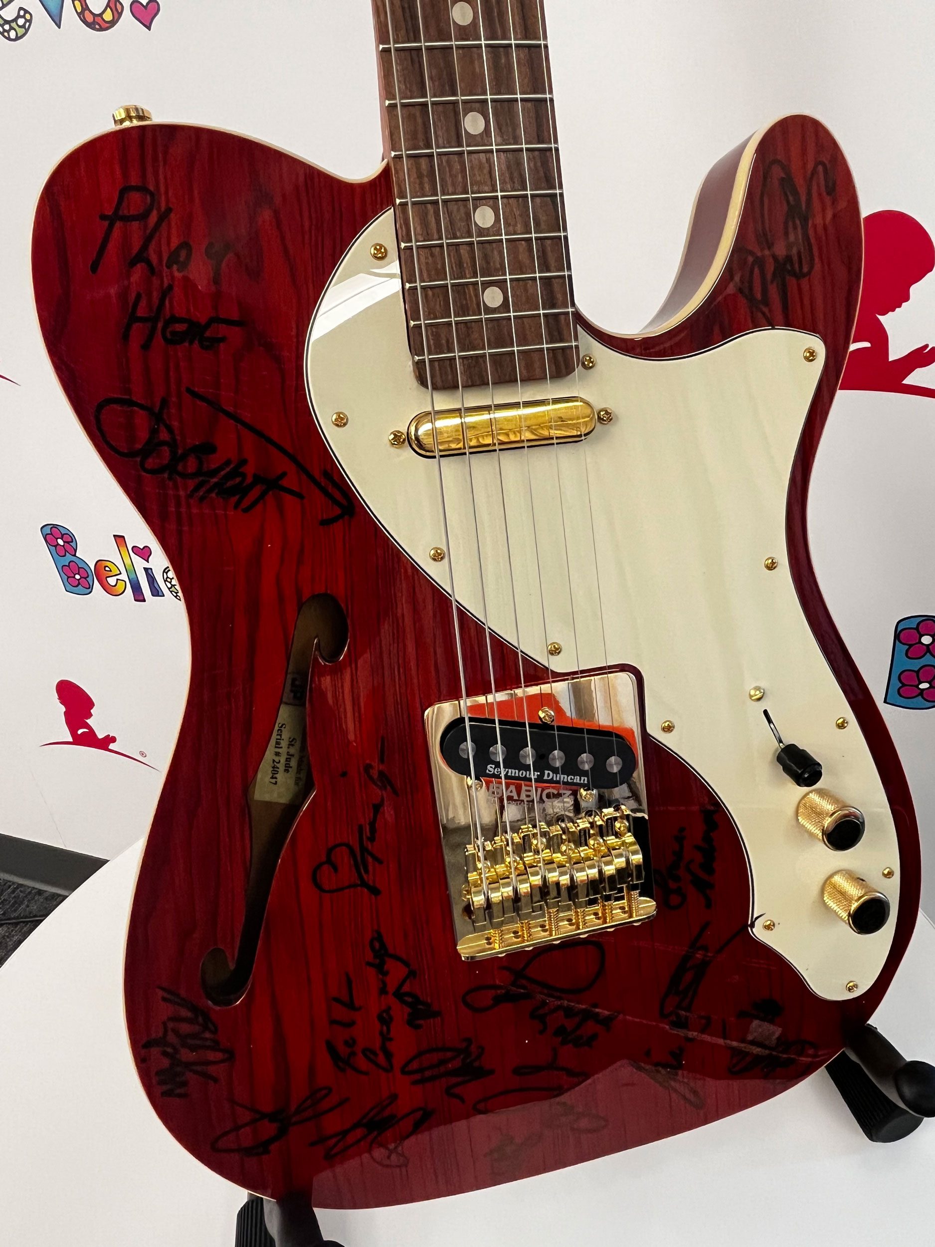 Signed custom guitar from Jimmy Buffett and band
