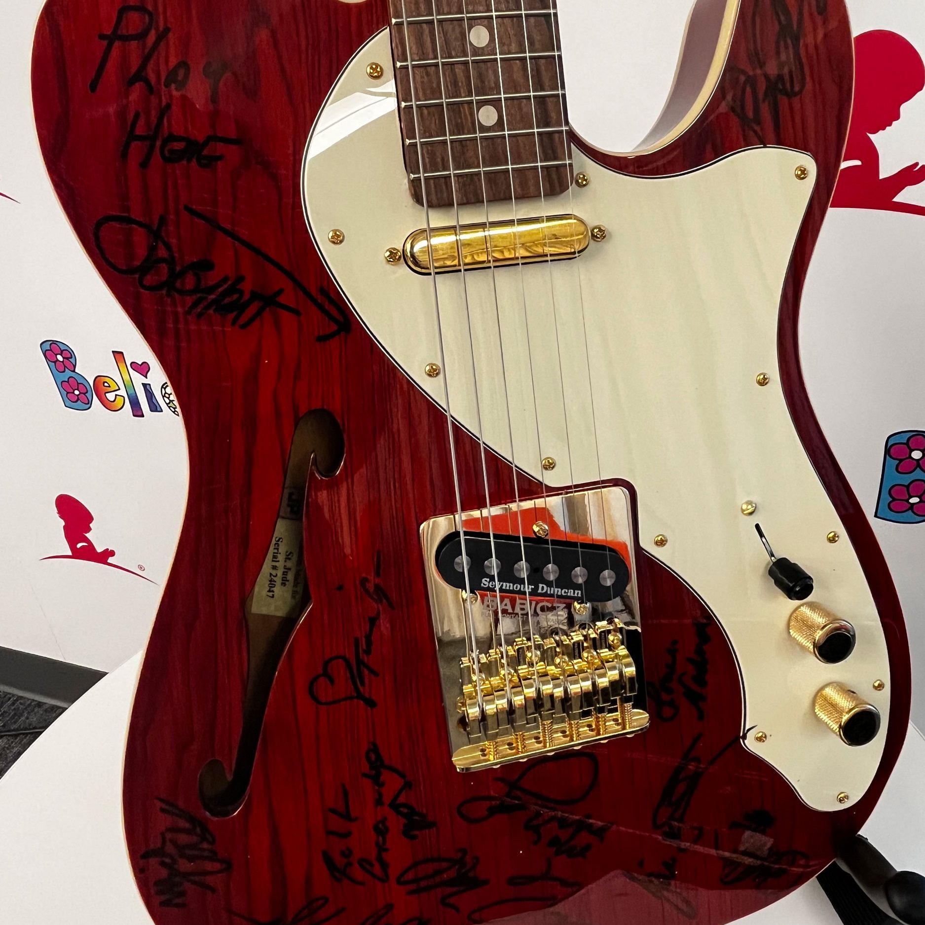 Signed custom guitar from Jimmy Buffett and band